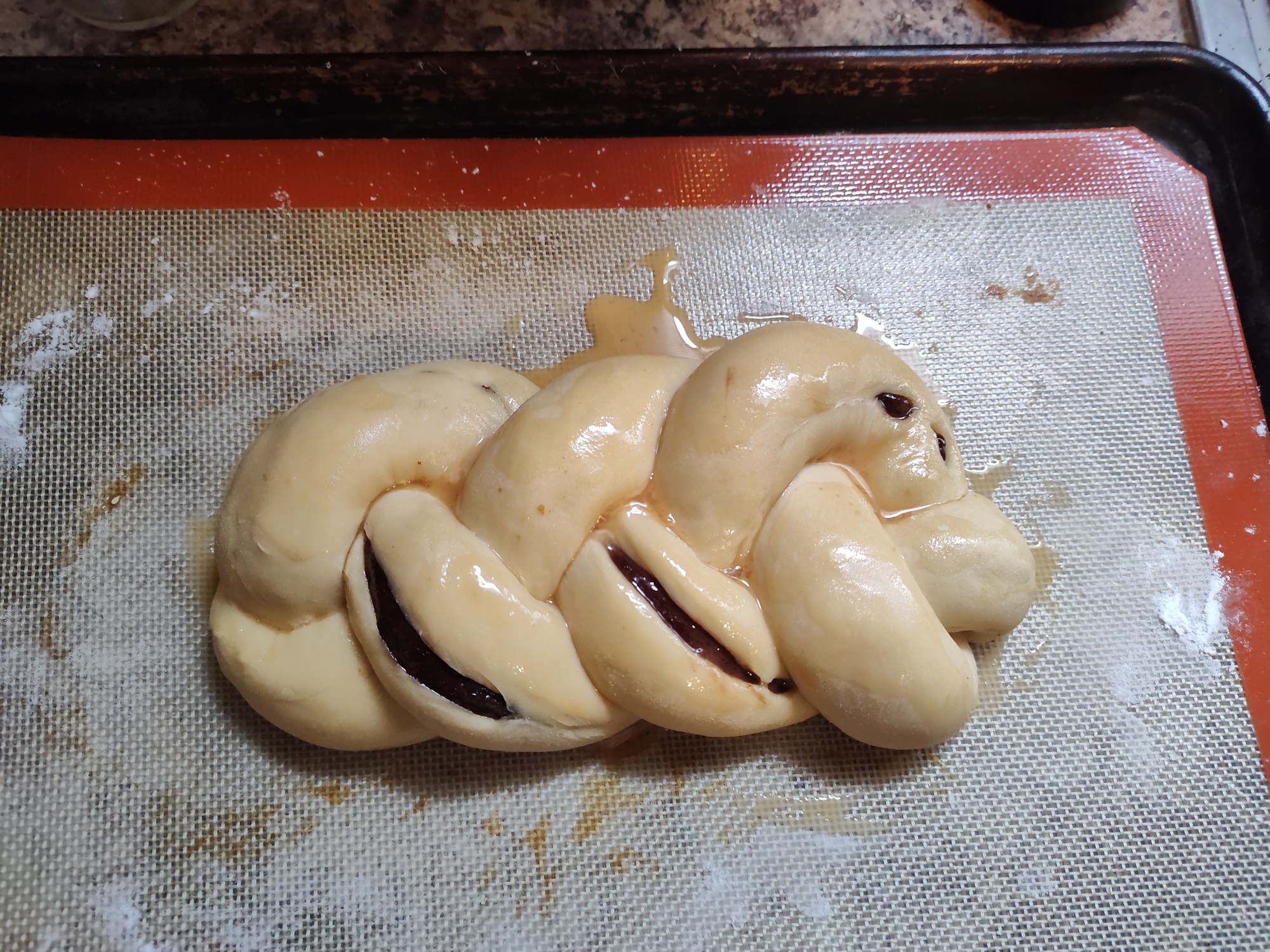 eggwashed loaf ready for the oven